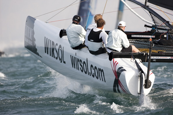 Team Extreme flying a hull on day 2 of the Extreme Sailing Series Muscat  Lloyd Images