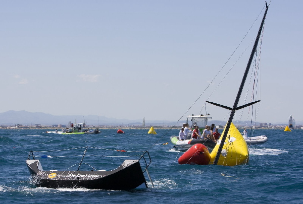 The CAM TP52 boat is sinking off Valencia's coast. Valencia, 13 July 2008. Photo copyright Maria Muia