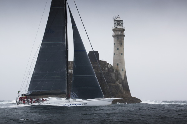 George David's RAMBLER100 rounding the Fastnet Rock - Photo By: Rolex / Daniel Forster 