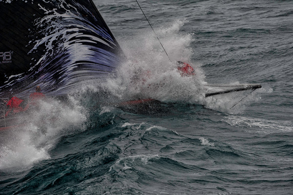 PUMA Ocean Racing powered by BERG, skippered by Ken Read from the USA, crashing through waves in heavy weather, at the start of leg 5 from Auckland, New Zealand to Itajai, Brazil, during the Volvo Ocean Race 2011-12. Credit: PAUL TODD/Volvo Ocean Race