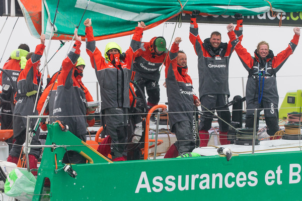 Groupama Sailing Team, skippered by Franck Cammas from France, celebrate taking first place on leg 8, from Lisbon, Portugal, to Lorient, France, during the Volvo Ocean Race 2011-12. (IAN ROMAN/Volvo Ocean Race) 
