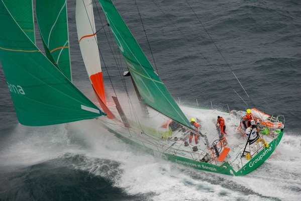 Race leaders Groupama Sailing Team, skippered by Franck Cammas from France, finish first on leg 8, from Lisbon, Portugal, to Lorient, France, during the Volvo Ocean Race 2011-12. (Credit: PAUL TODD/Volvo Ocean Race) 