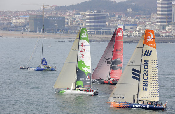 In a dramatic opening to leg five of the Volvo Ocean Race, minutes before the start gun fired, Telefónica Blue (Bouwe Bekking/NED) dropped her sails and returned to port, leaving a fleet reduced to three boats to contest the start in Qingdao. Photocredit: Rick Tomlinson/Volvo Ocean Race
