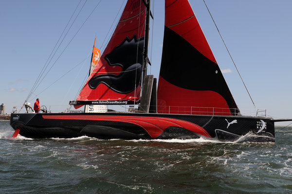 Sailing legend Michel Desjoyeaux, winner of this year's Vendee Globe and three-times Whitbread Round the World Race veteran, takes PUMA Ocean Racing's 'il mostro' for a solo spin in Boston Harbour during the Volvo Ocean Race stopover.. Photocredit: Dave Kneale/Volvo Ocean Race