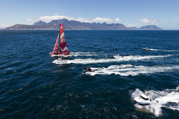 	CAMPER with Emirates Team New Zealand, skippered by Chris Nicholson from Australia finishes second on leg 1 of the Volvo Ocean Race 2011-12 from Alicante, Spain to Cape Town, South Africa, at 10:48:04 UTC. (Photo Credit must read: IAN ROMAN/Volvo Ocean Race) 